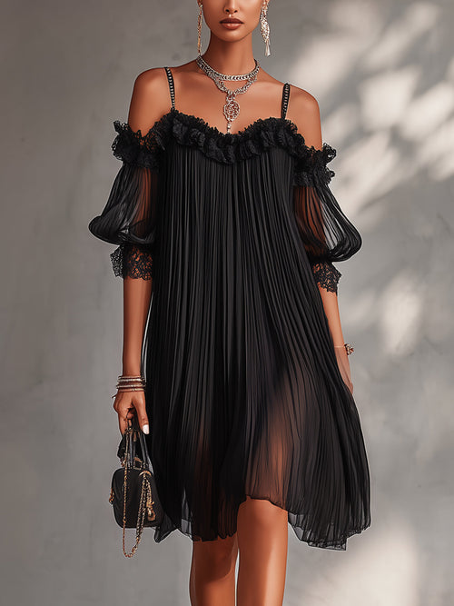 Vestido negro de muselina con hombros descubiertos, mangas abullonadas y ribete de encaje