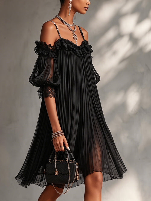 Vestido negro de muselina plisada con hombros descubiertos y ribete de encaje en mangas