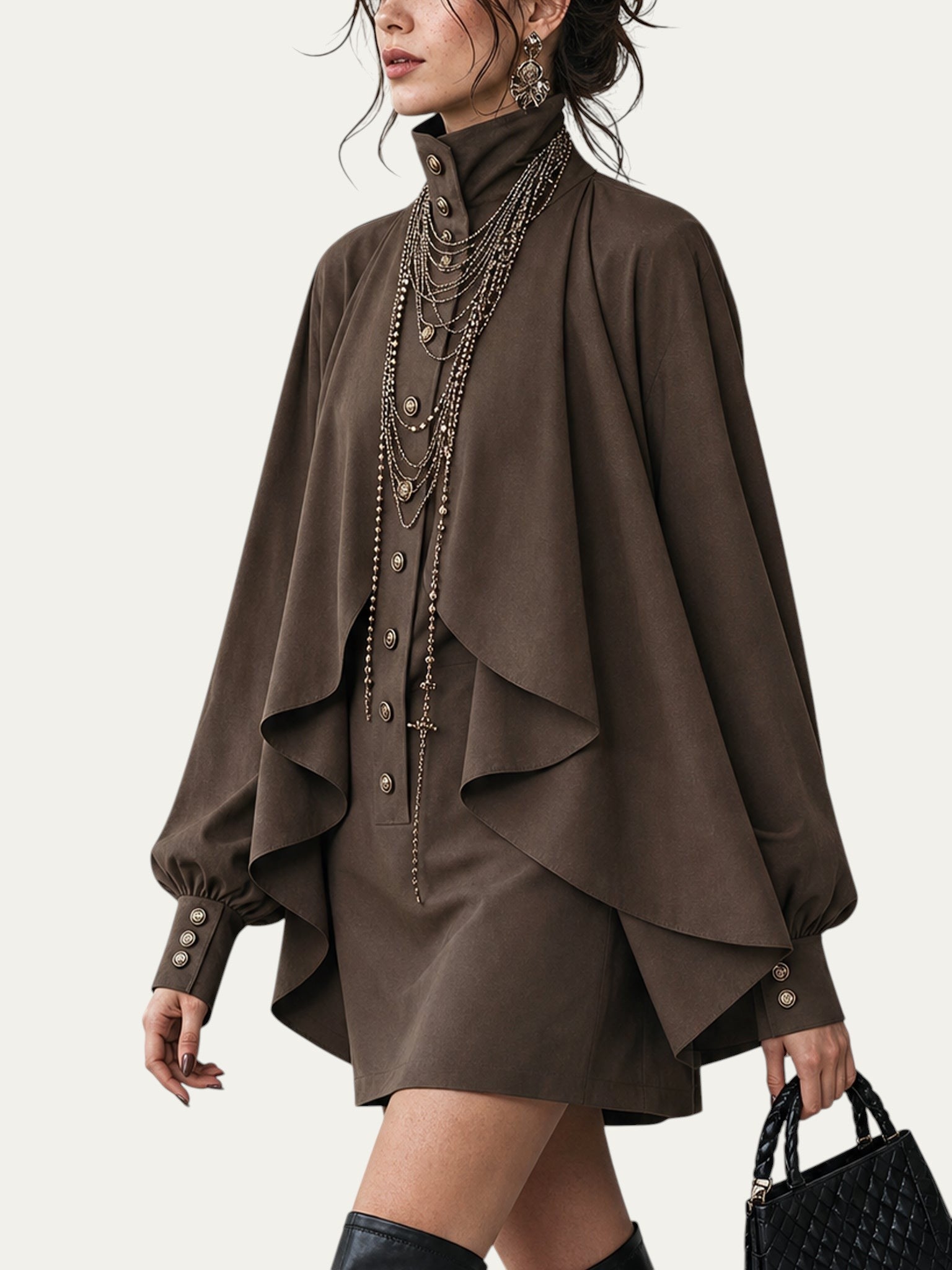 Minivestido chocolate de cuello alto con paneles tipo capa y mangas abullonadas