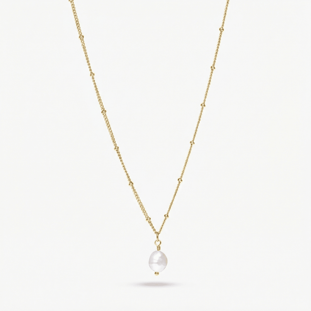 Colgante de perla barroca dorado con cadena fina y colgante redondeado