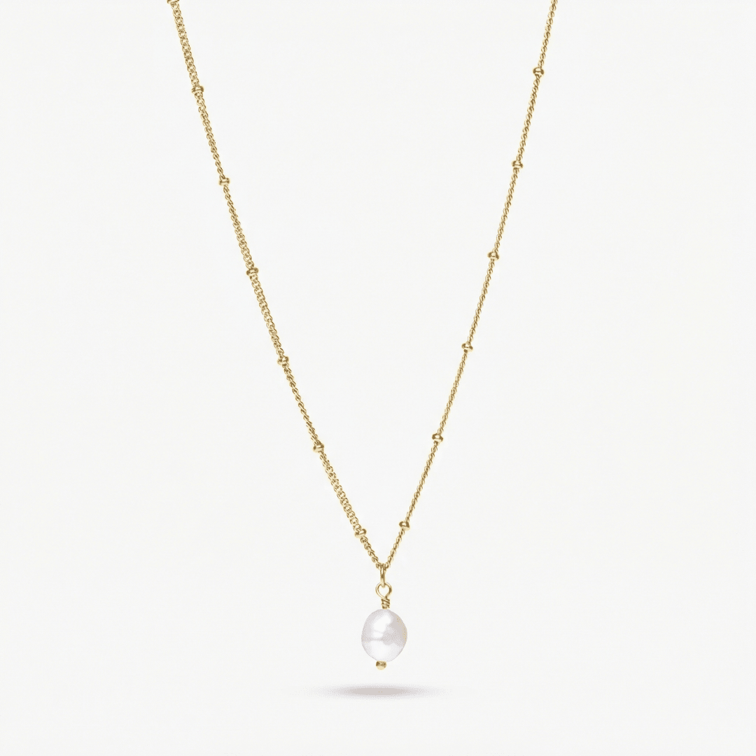 Colgante de perla barroca dorado con cadena fina y colgante redondeado