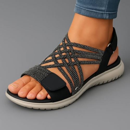 Sandalias ortopédicas negras con malla trenzada y tira ajustable con velcro
