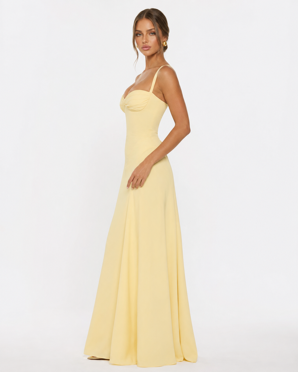 Vestido largo tipo corsé Golden Hour amarillo claro, vista lateral con falda amplia