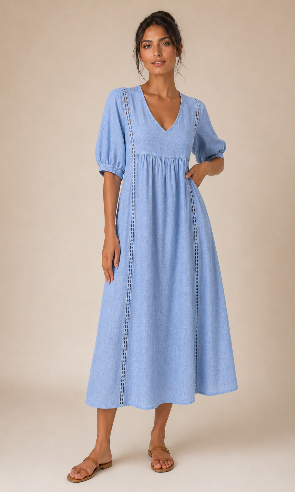 Vestido veraniego azul claro con escote en V, mangas abullonadas y bordado vertical