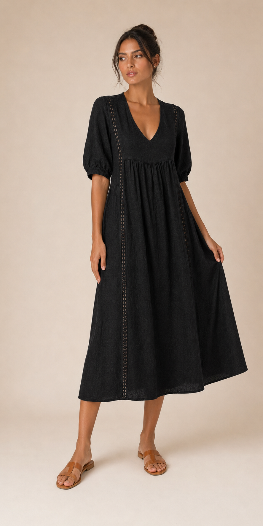 Vestido veraniego negro con escote en V, mangas abullonadas y bordado en laterales