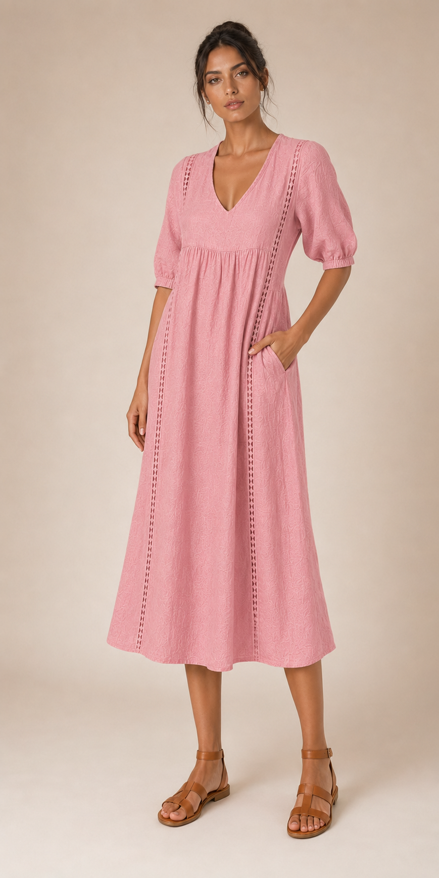 Vestido veraniego rosa palo con escote en V, mangas abullonadas y bordado vertical