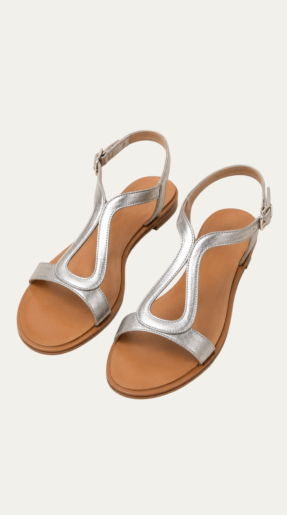 Sandalias planas metalizadas plateadas con tira frontal en forma de T