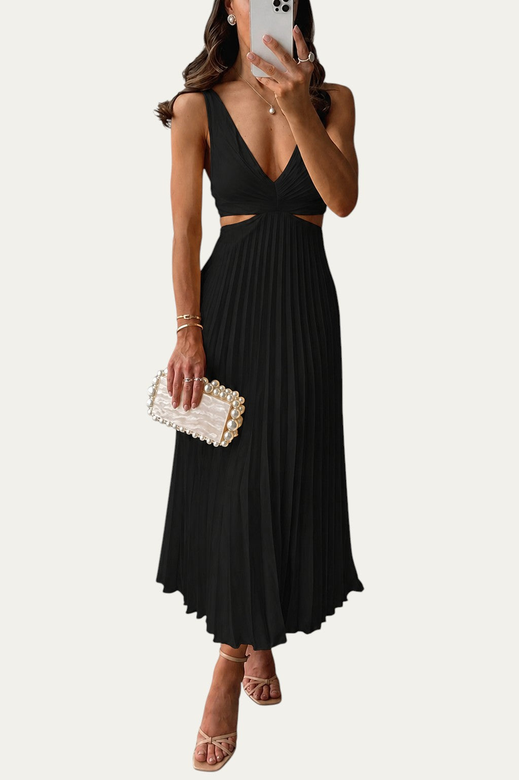 Vestido largo elegante negro con escote en V, cintura marcada y falda plisada