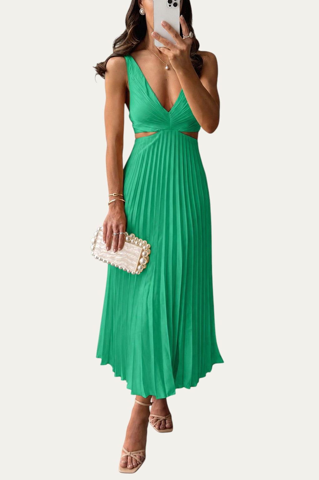Vestido largo elegante verde con escote en V, cintura marcada y falda plisada