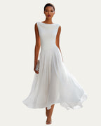Vestido midi blanco sin mangas con escote barco y falda plisada abullonada