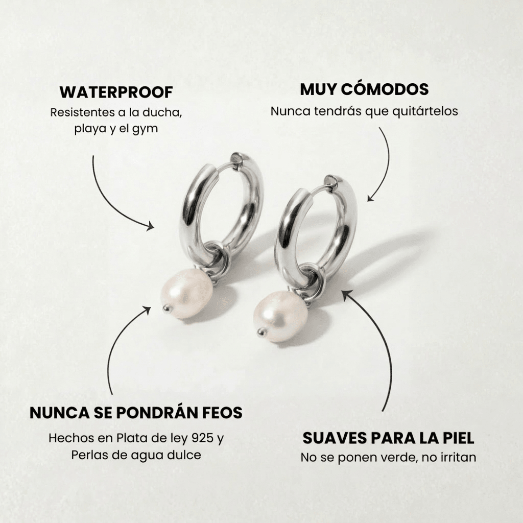 Aros plateados tipo argolla con perla blanca colgante, diseño redondeado
