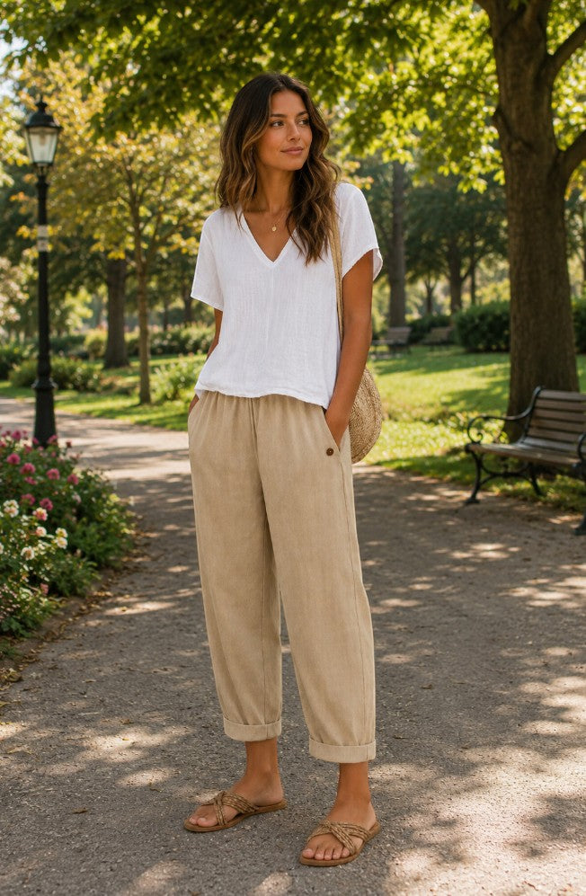 Pantalones de lino ligeros beige con cintura elástica y cordón, puños al tobillo