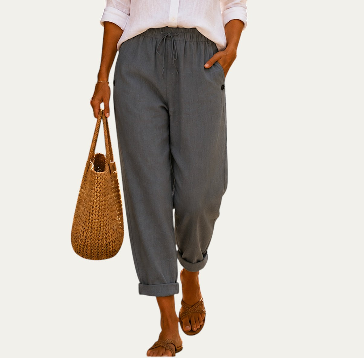 Pantalones de lino ligeros grises con cintura elástica, cordón y bajo con puños