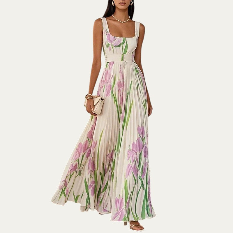 Vestido largo sin mangas con estampado de flores rosas y hojas verdes sobre blanco
