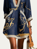 Minivestido azul marino con estampado dorado y borde inferior de encaje de ganchillo