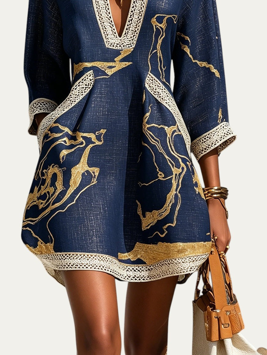 Minivestido azul marino con estampado dorado y borde inferior de encaje de ganchillo