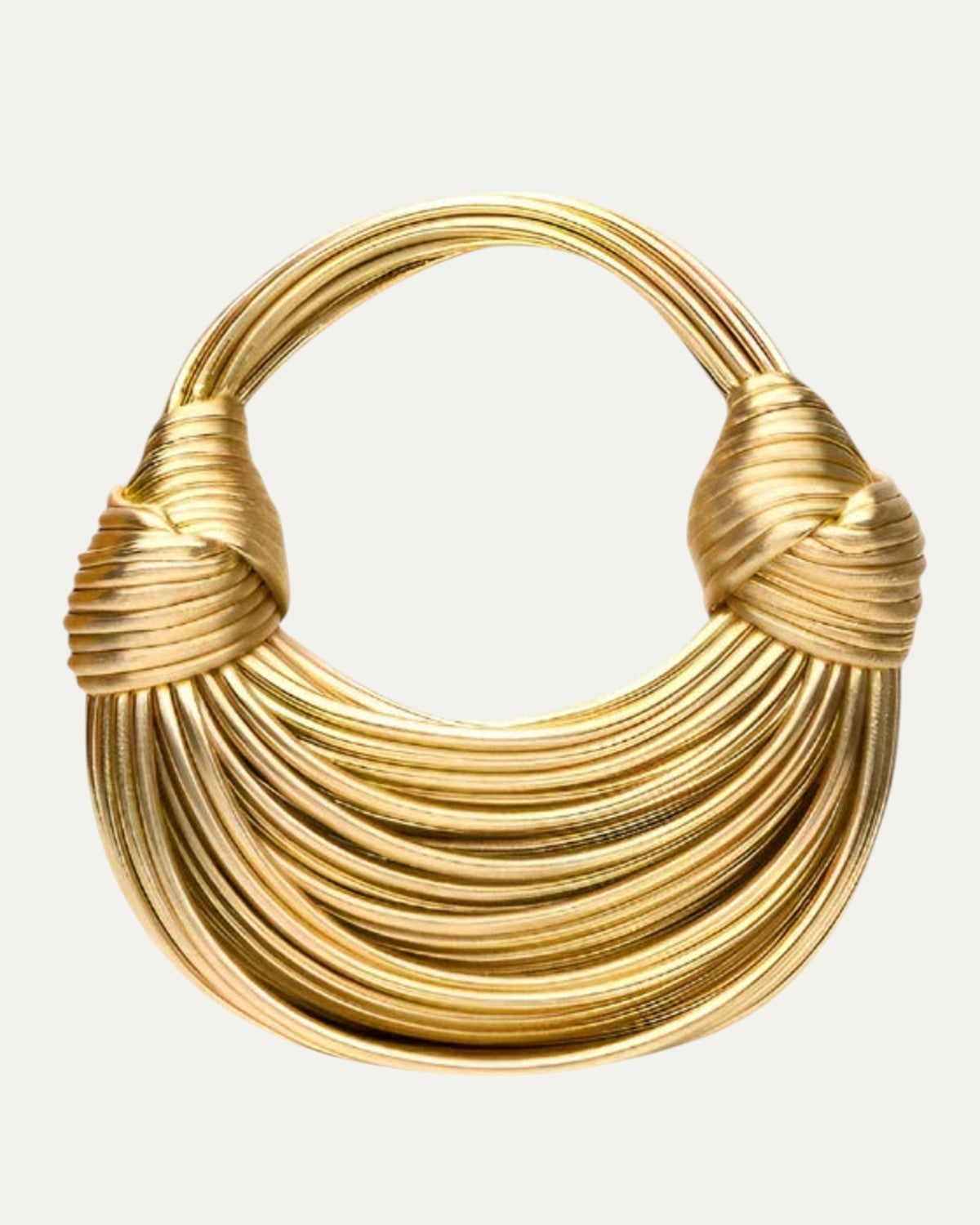 Bolso esencial tipo aro dorado de anillos superpuestos con asas trenzadas