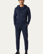 Conjunto de cachemir Amalfi azul marino con cremallera y capucha, y pantalón ajustado