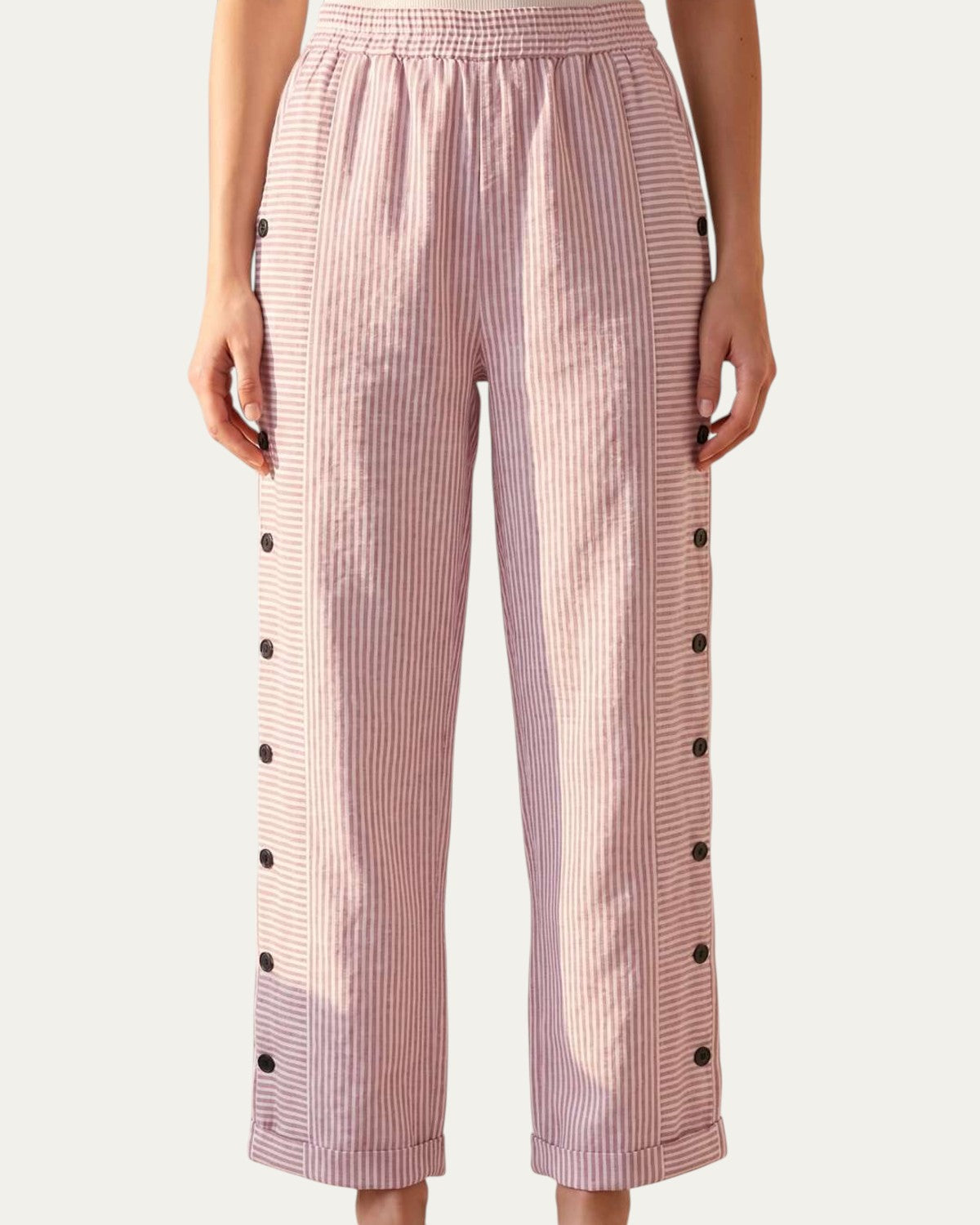 Pantalón mujer a rayas rosa claro con cintura elástica y botones en el lateral