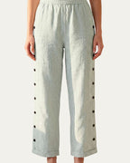 Pantalón mujer a rayas verde claro con cintura elástica y botones laterales