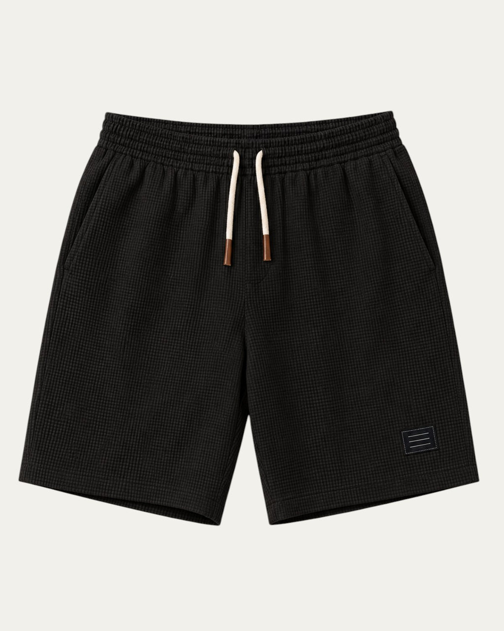 Bermudas elegantes negras de tela texturizada con cintura elástica y cordón