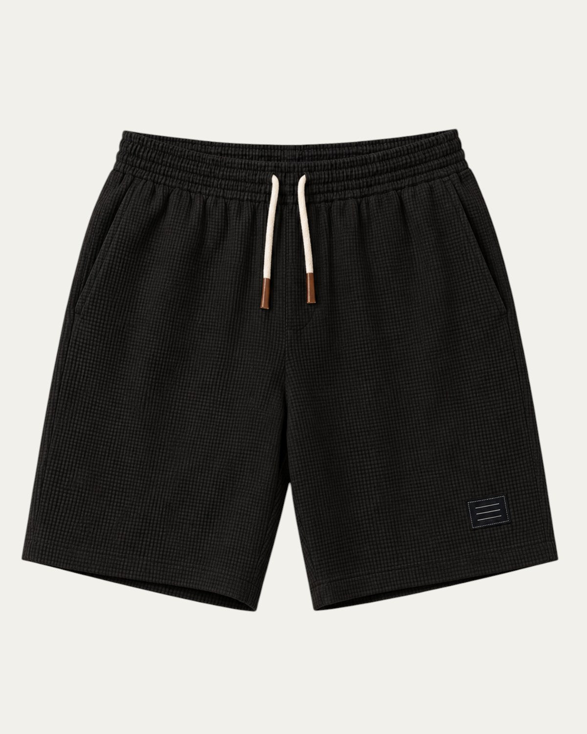 Bermudas elegantes negras de tela texturizada con cintura elástica y cordón