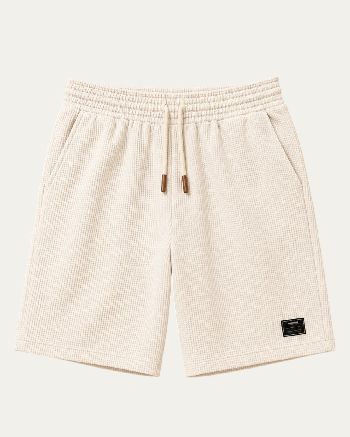 Bermudas elegantes blancas con cintura elástica y cordón, etiqueta lateral