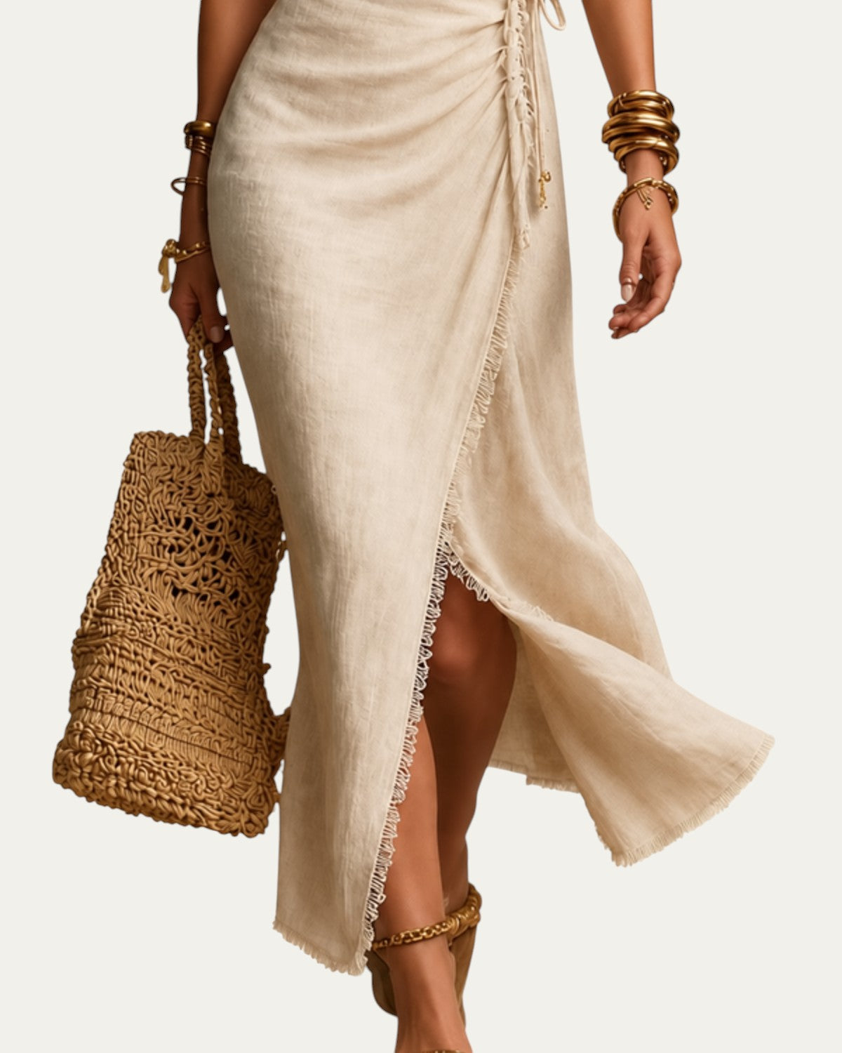 Vestido midi de lino beige con abertura lateral y dobladillo asimétrico
