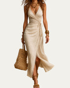 Vestido midi de lino beige sin mangas, escote en V cruzado y abertura lateral