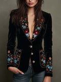 Blazer negro de Giulia con bordado floral multicolor y solapa con ribete dorado