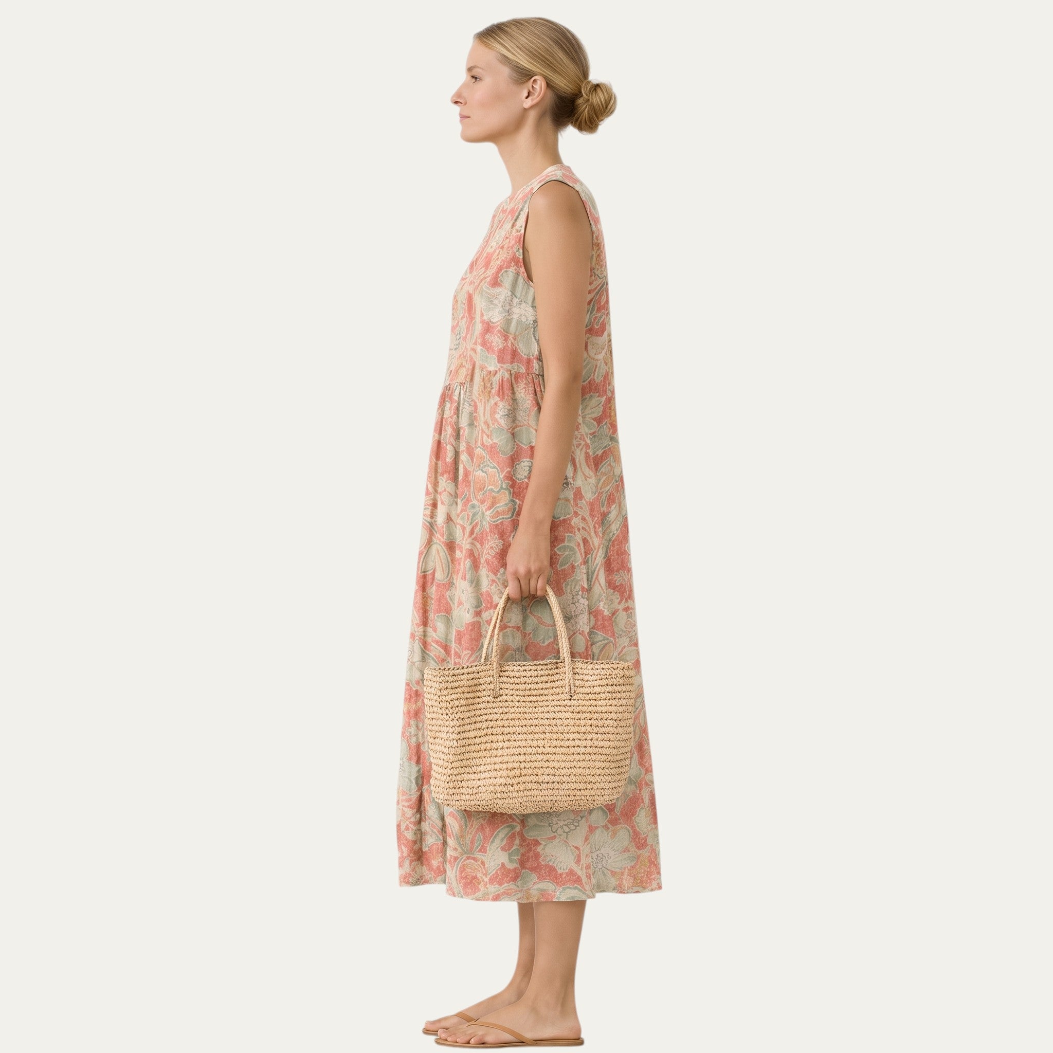 Vestido midi sin mangas con estampado floral coral y verde, perfil lateral