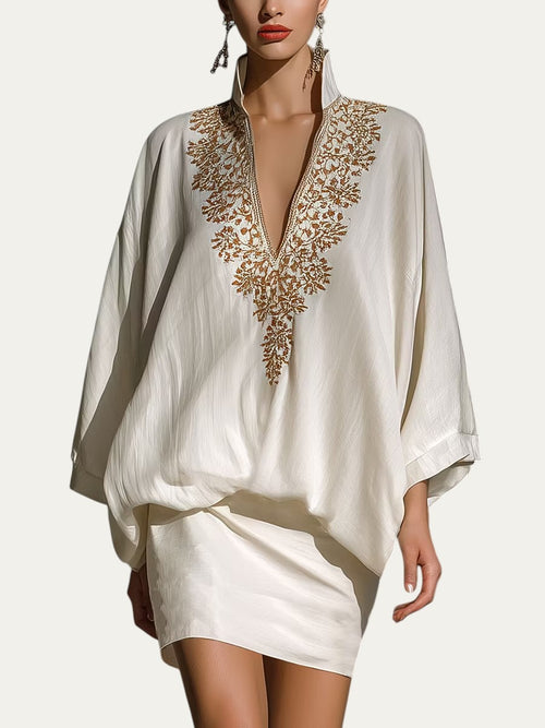 Conjunto de blusa holgada y minifalda blanca con escote en V y bordado dorado