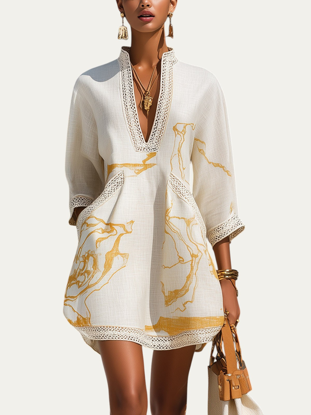 Minivestido marfil con estampado dorado y encaje crochet en el escote V