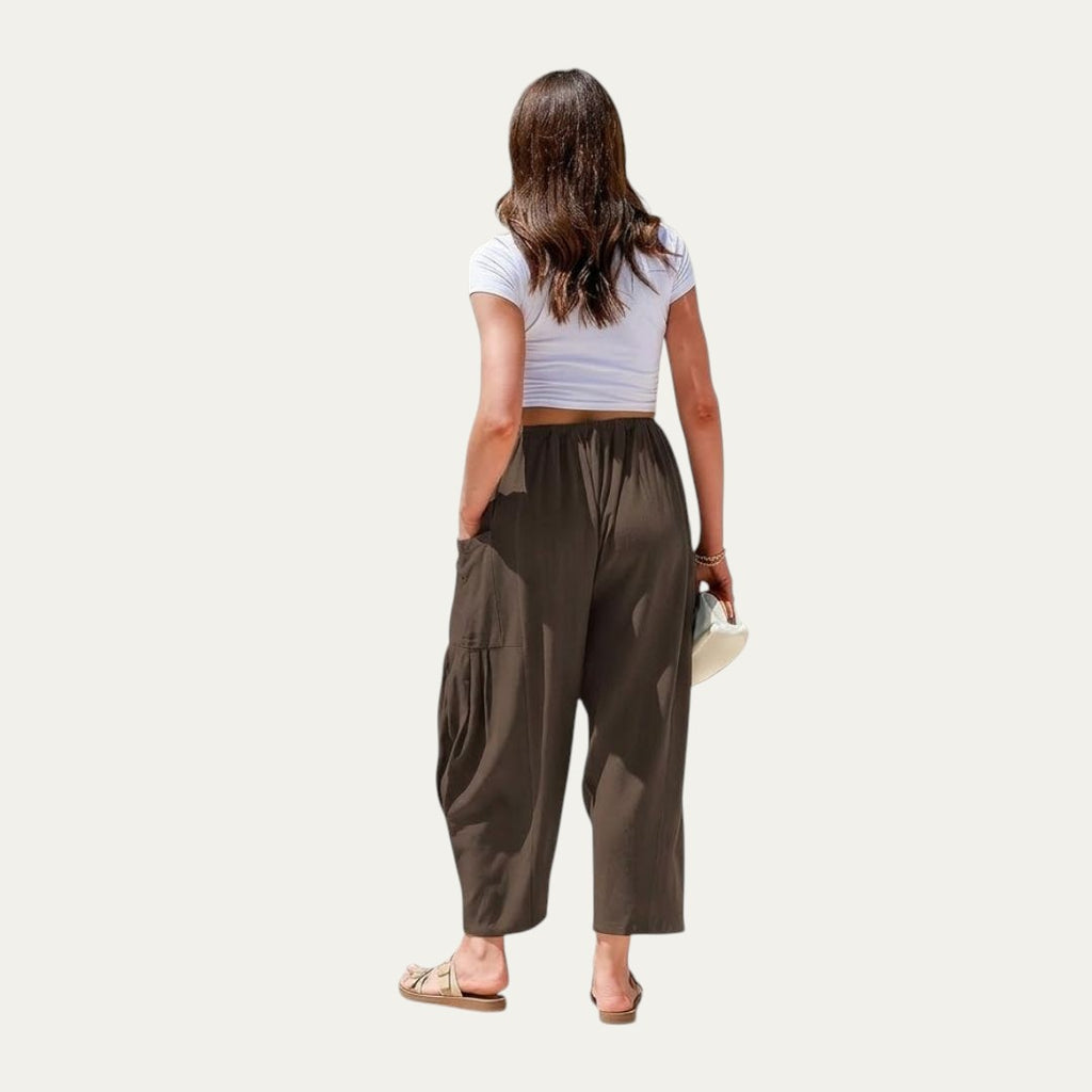 Pantalones fluidos verde oscuro con pernera amplia y cintura elástica