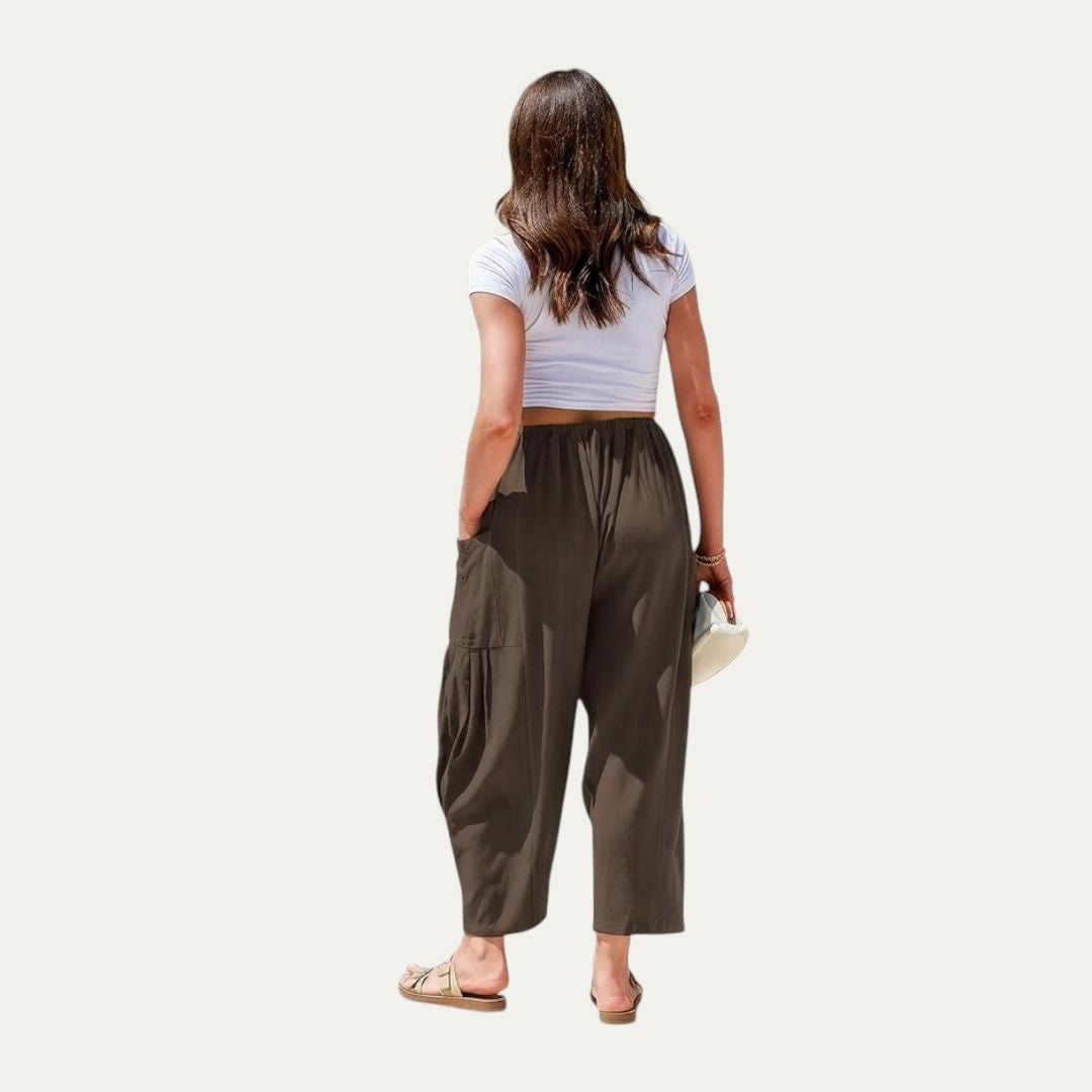 Pantalones fluidos verde oscuro con pernera amplia y cintura elástica