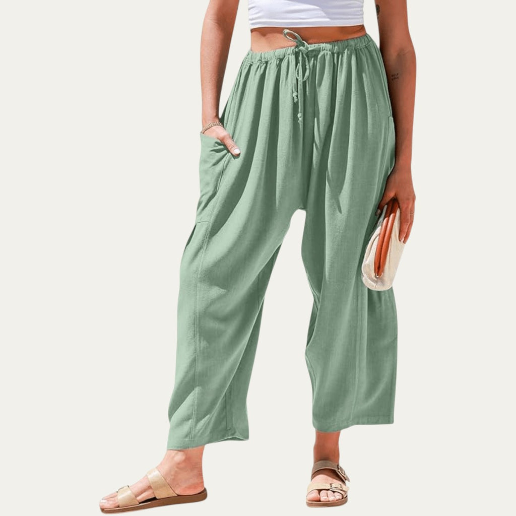 Pantalones fluidos verdes, cintura elástica con cordón, pliegues, pierna amplia
