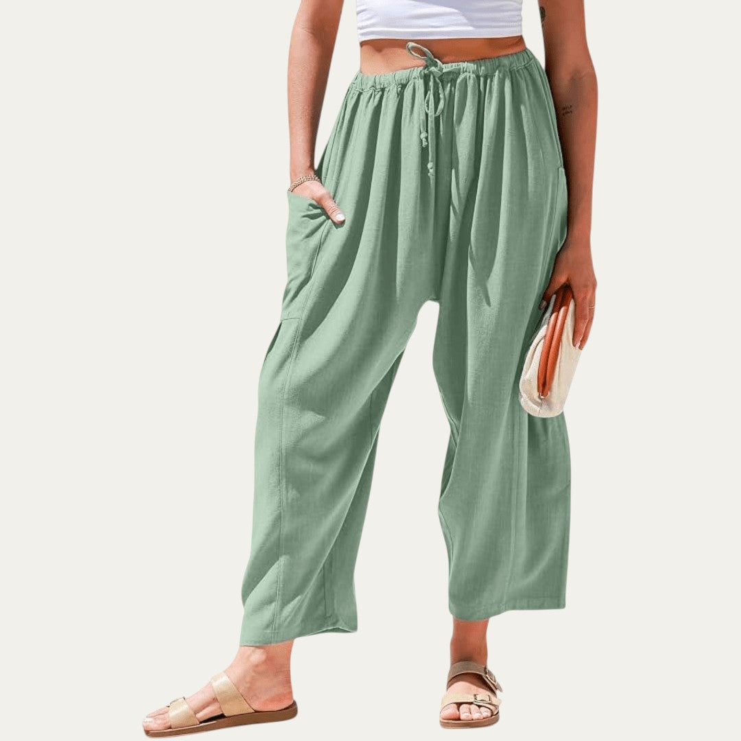 Pantalones fluidos verdes, cintura elástica con cordón, pliegues, pierna amplia
