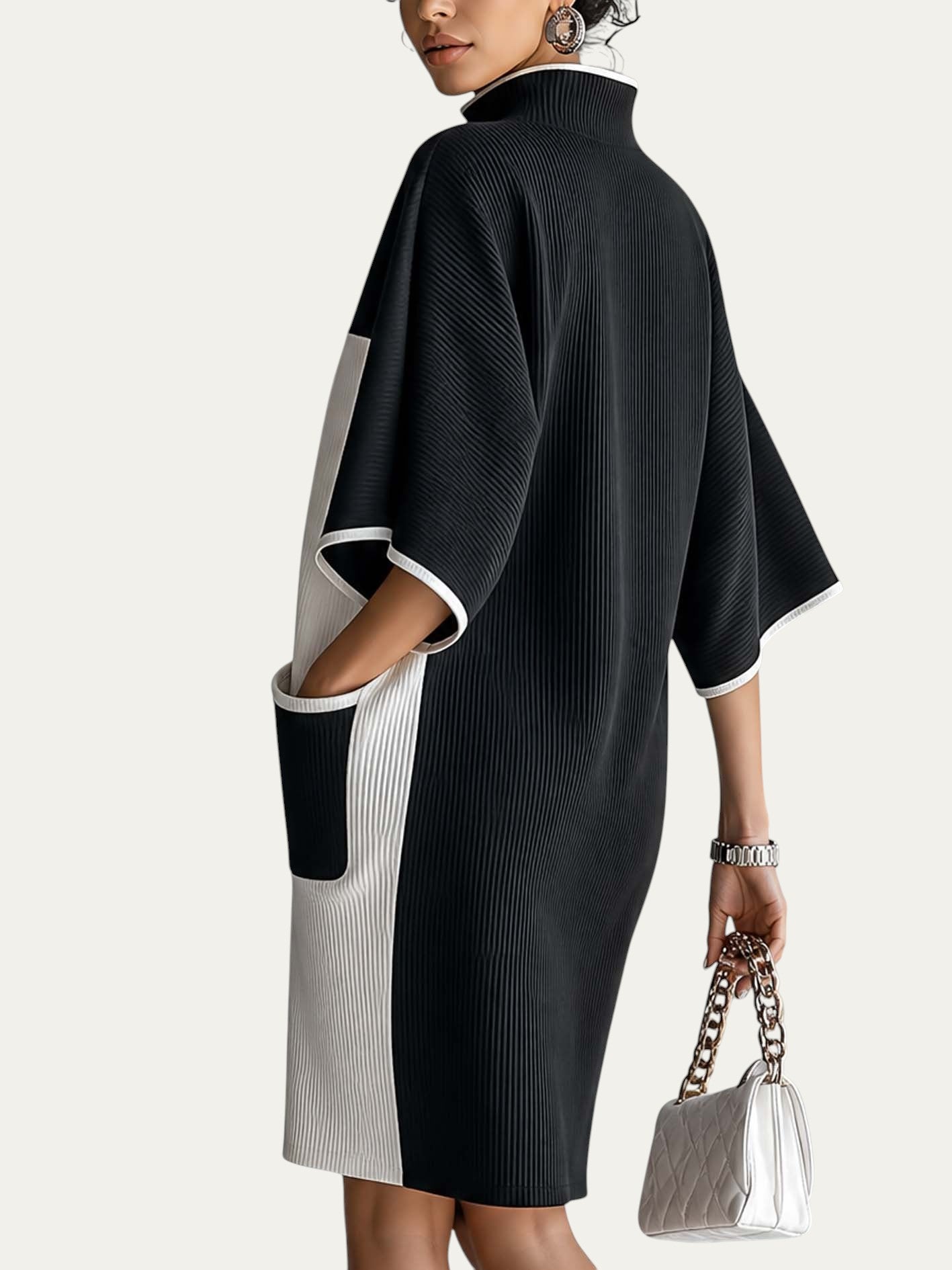 Vestido midi blanco y negro con mangas murciélago tipo kimono y cuello alto