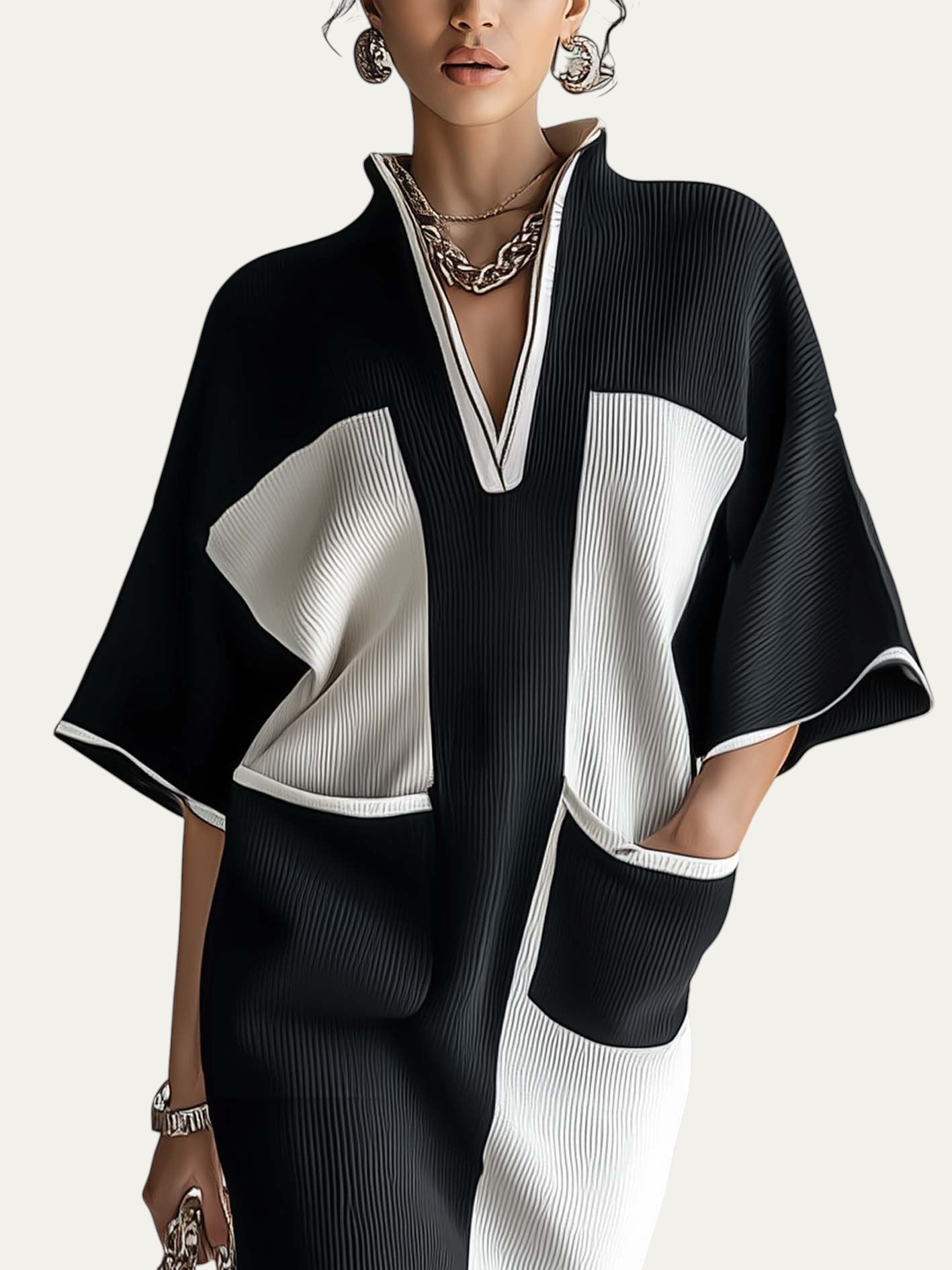 Vestido midi color block blanco y negro, escote pico y bolsillos tipo parche
