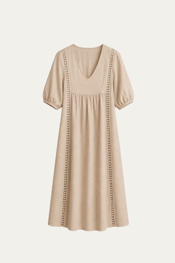 Vestido veraniego beige con escote pico y mangas abullonadas, dobladillo acampanado