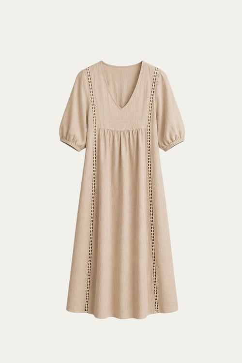 Vestido veraniego beige con escote pico y mangas abullonadas, dobladillo acampanado