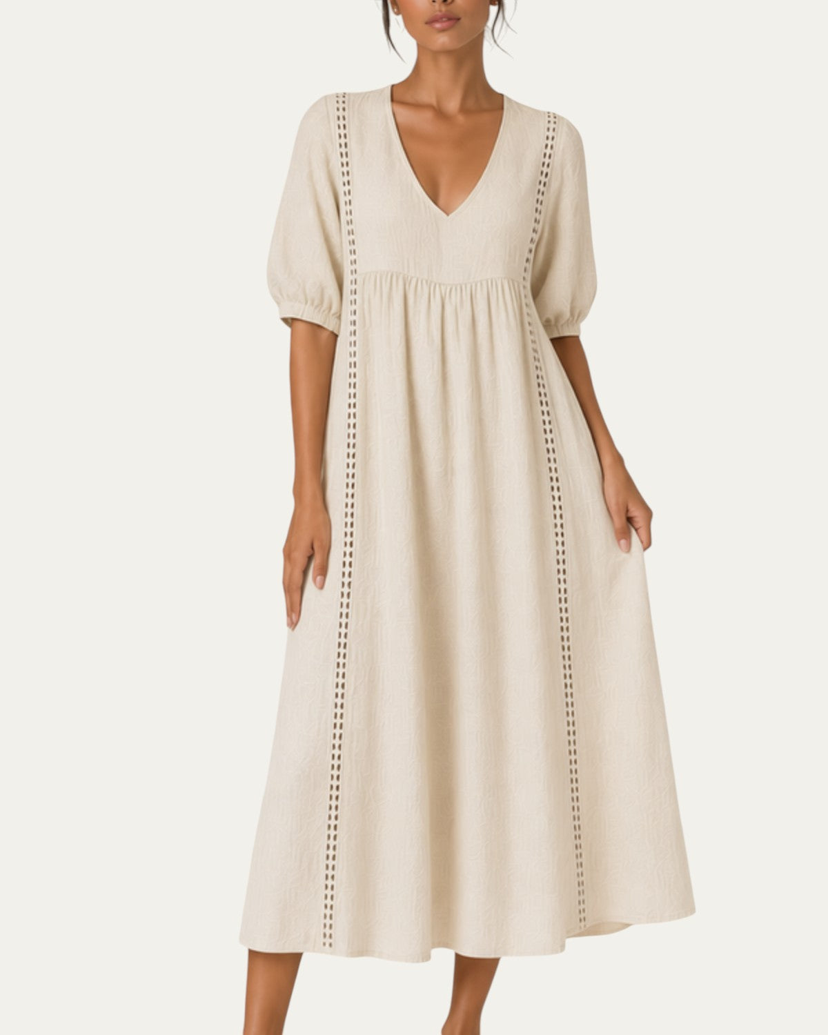 Vestido veraniego beige, cuello pico y mangas globo con costuras decorativas verticales