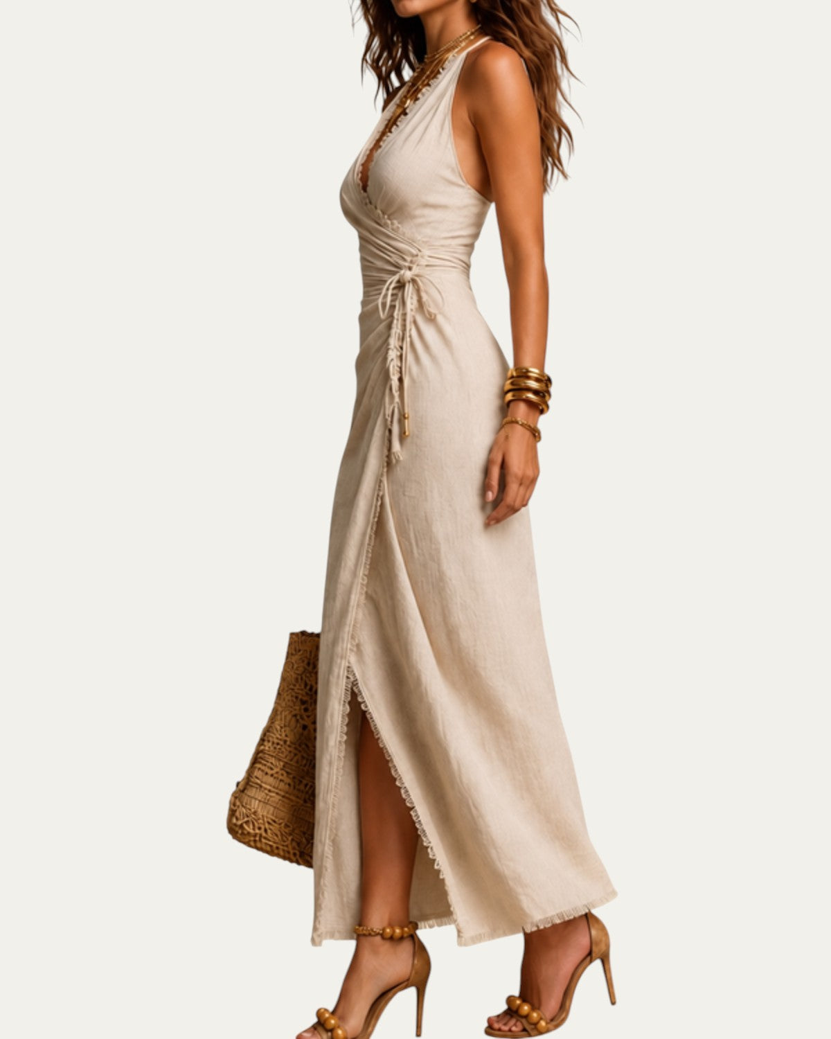 Vestido midi de lino beige sin mangas, escote cruzado y fruncido en la cintura
