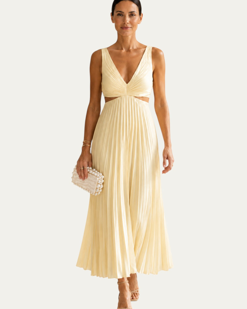 Vestido largo elegante Helen amarillo claro, escote en V y falda plisada con tirantes finos