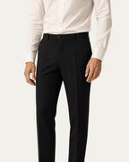 Pantalón Horizon recto slim negro con cinturilla, botón y costuras verticales