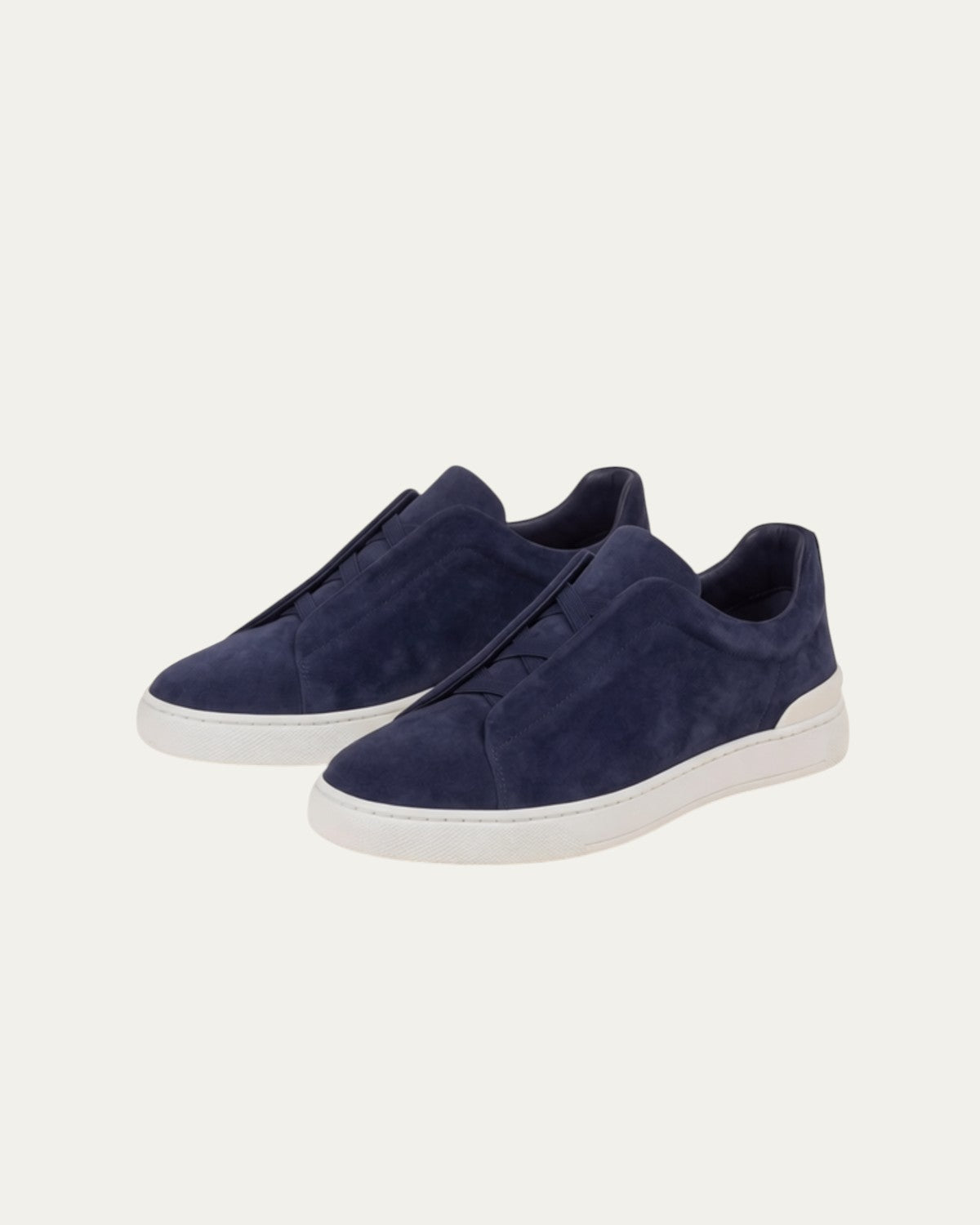 Zapatillas de ante azul marino slip-on con suela blanca, par completo